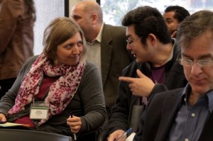 Pamela Neumann and fellow graduate sociologist Yu Chen engage in a moment of intellectual conversation