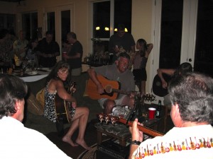 Sociology Undergraduate Advisor Debbie Rothschild (left) strumming the guitar fantastic.